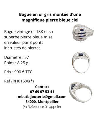 Bague or gris 750 montée d'une magnifique pierre bleue ciel Paris Déstockage Promo